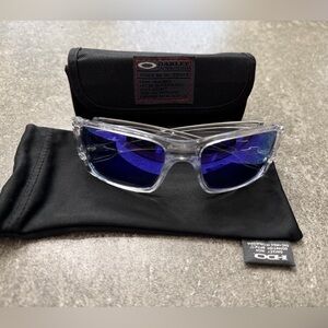 Oakley Transparent Gascan wrap Frame glasses with mirrored polarized Lenses